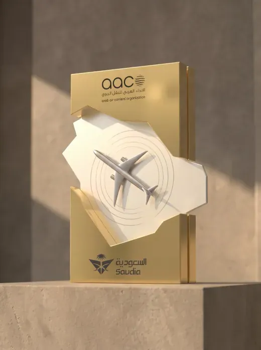 Gold rectangular award with an aircraft motif